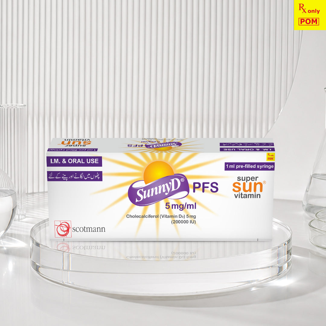 A box of SunnyD PFS super sun vitamin 5 mg/ml pre-filled syringe by Scotmann, displayed on a clear glass stand against a white background with vertical ribbed panels.