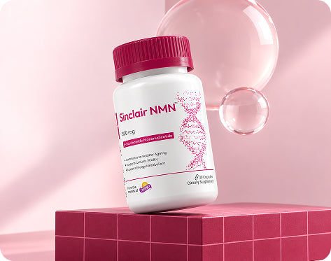 A white bottle of Sinclair NMN dietary supplement with a magenta cap, displayed on a pink block with a pink gradient background and floating bubble graphics.